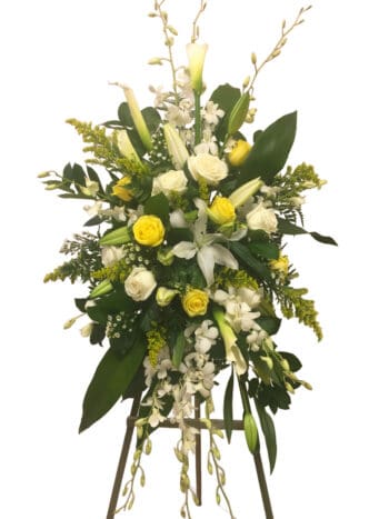 A bouquet of flowers on display in a vase.